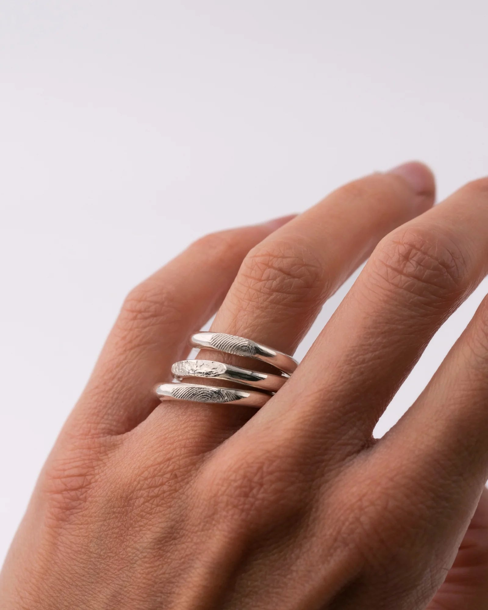 Trio de Bague et earcuff en argent avec empreintes digitales et animales.